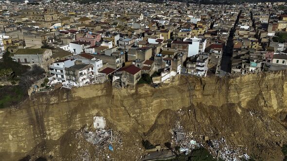 Panic in European town as horror landslide leaves homes dangling off 25m abyss