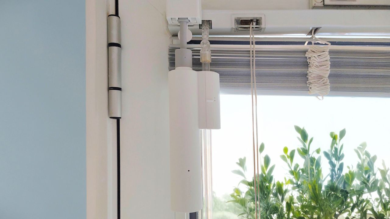 This little gadget turned me into a morning person by opening my bedroom blinds automatically — and it only took five minutes to install