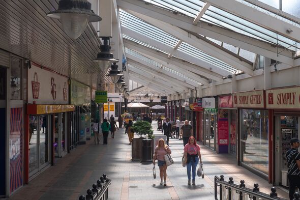 Abandoned UK shopping centre bulldozed after all 30 shops closed in one hour