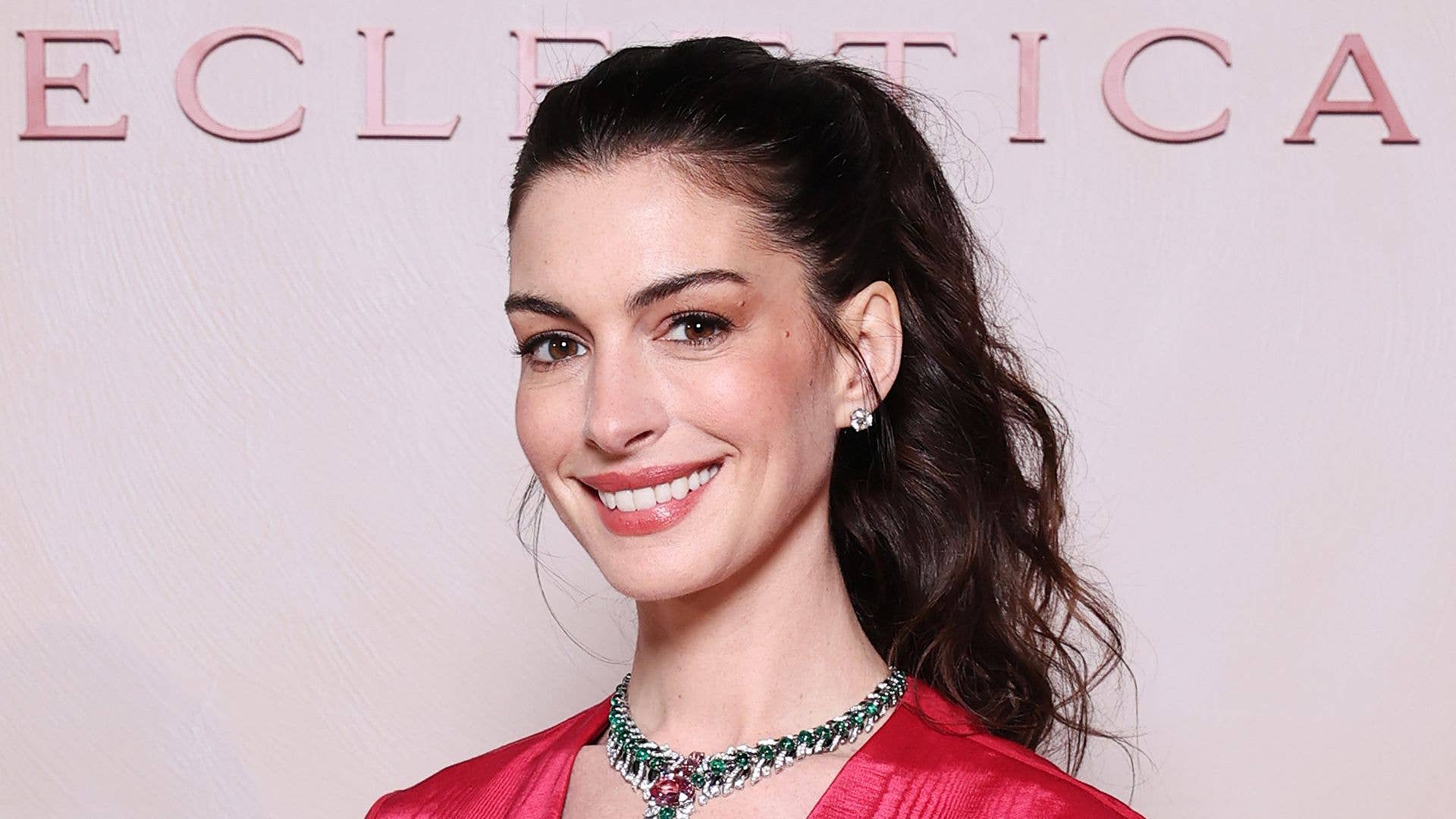 Anne Hathaway looks phenomenal in Miranda Priestly-inspired voluminous red gown