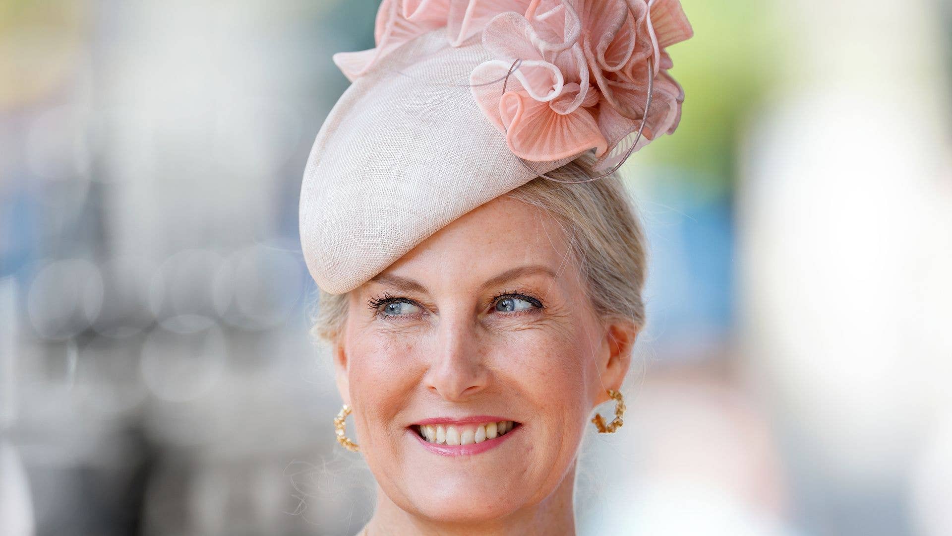 Duchess Sophie schools us in styling a rose gold ‘high shine’ dress in your 60s