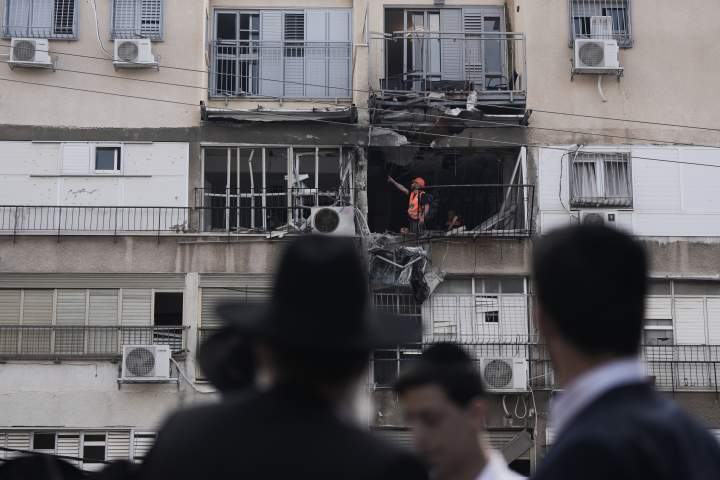 Iran threatens to widen war as Gulf Arab states intercept new missiles