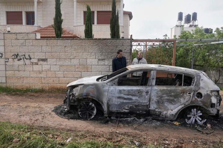 Israeli settlers attack Palestinians, set fires in West Bank after funeral