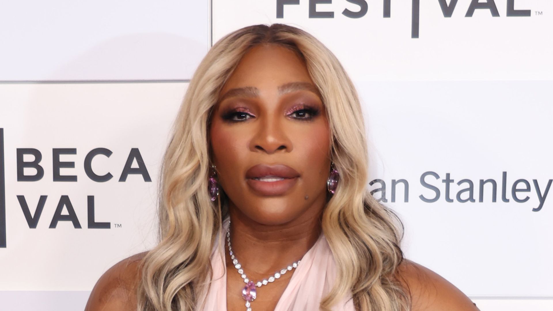 Serena Williams resurrects Barbiecore in slinky pink dress for stunning photos