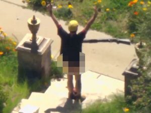 Suspect Without Pants Surrenders to SWAT Team After Standoff, on Video