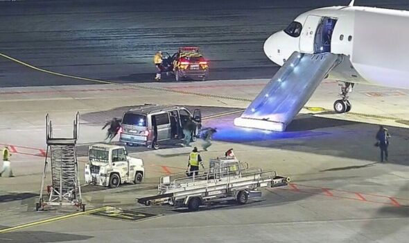 Terror on Tenerife plane as passenger opens door and disappears down emergency slide