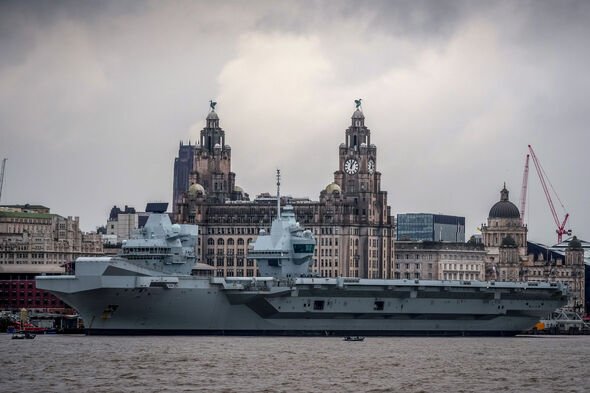 UK readies aircraft carrier as Middle East crisis explodes after Trump threat