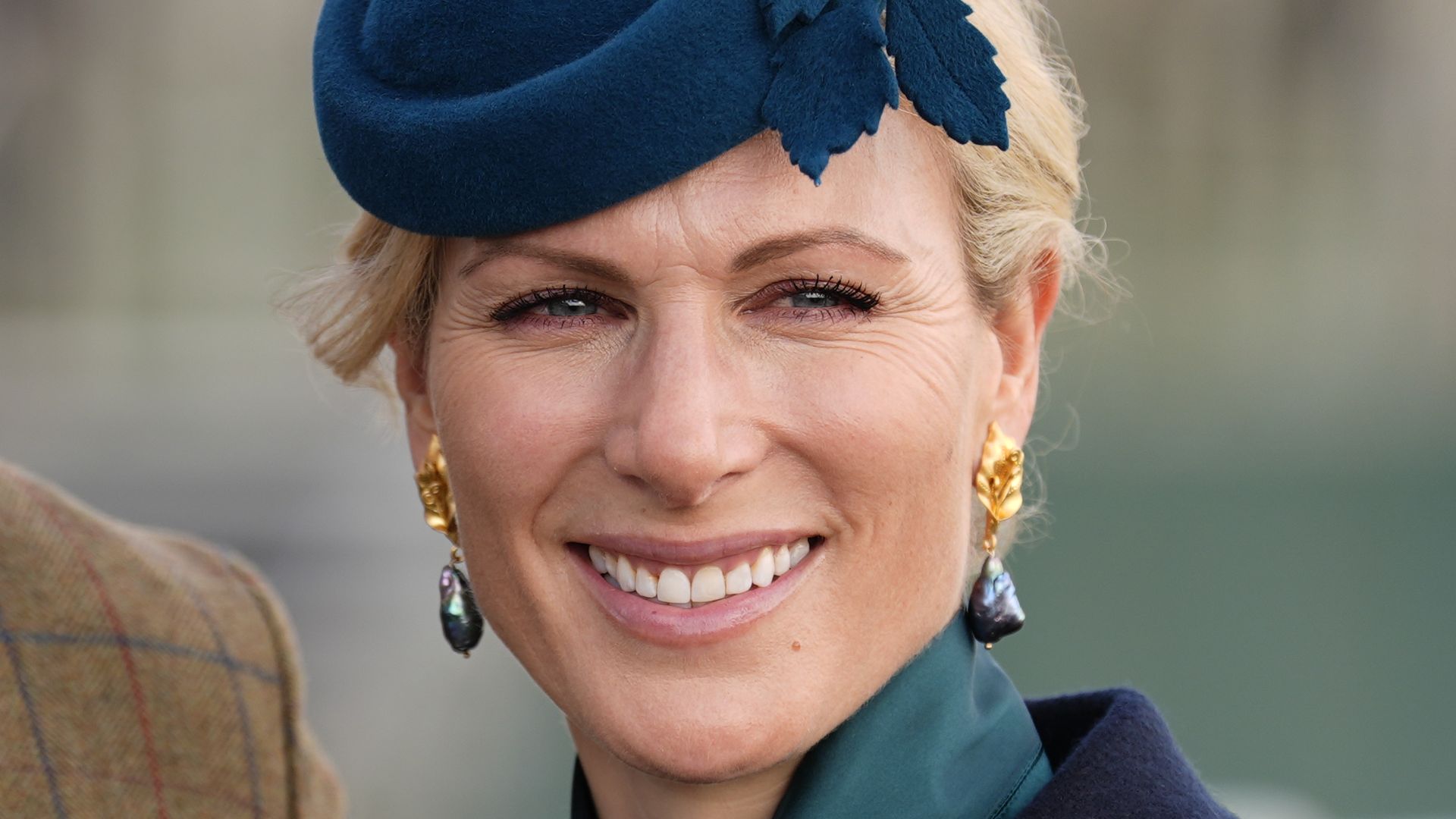 Zara Tindall steals the show at Cheltenham Festival in dramatic leaf-sprouting hat