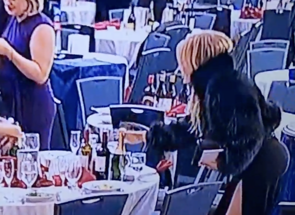 Woman snatches wine bottles during White House Correspondents’ Dinner shooting chaos
