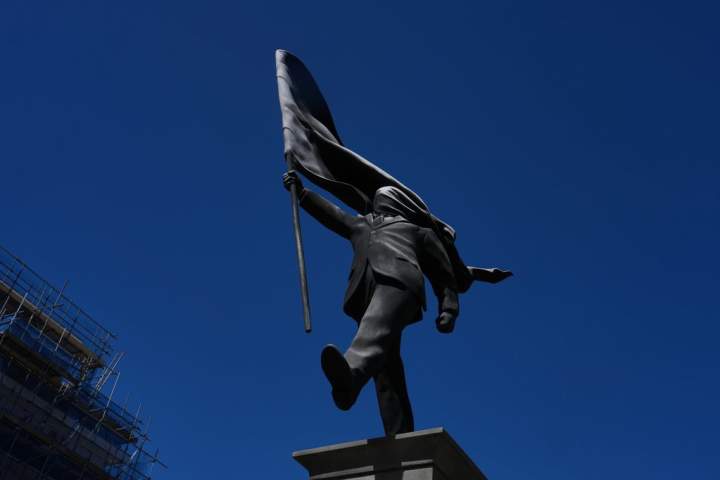 Banksy confirms new central London statue of a man blinded by a flag is his