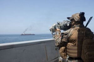 Iran fires at three US warships in Strait of Hormuz as ceasefire on brink of collapse