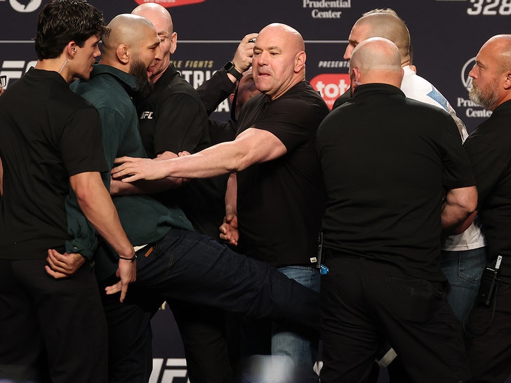 Khamzat Chimaev Kicks Sean Strickland At UFC Presser, Armed Security On Stage