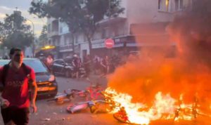 Paris in flames as riot police attack PSG fans in furious battles across French capital