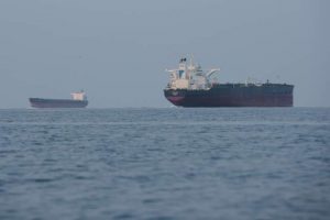 Trump says he has paused effort to guide vessels from the Strait of Hormuz