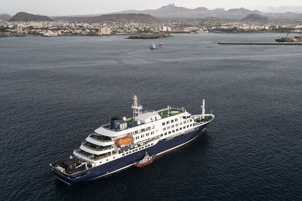 Virus infected ship docks at Tenerife as officials insist outbreak is ‘not another Covid’