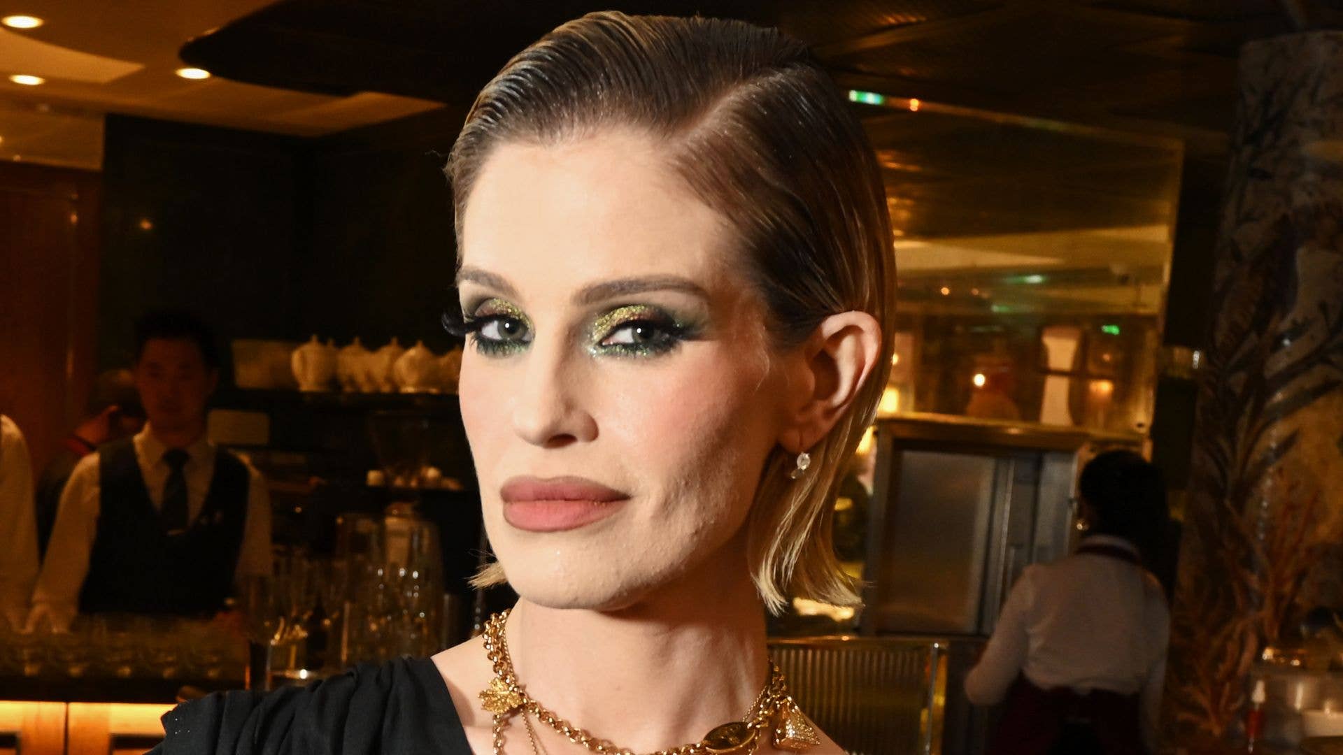 Kelly Osbourne wows in waist-cinching dress after musical comeback