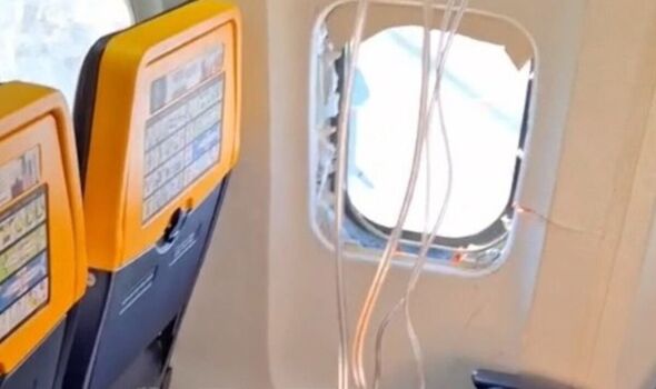 Panic on Ryanair flight as passenger ‘sucked out of window up to his shoulders’