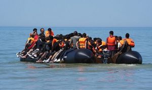 British charity hands migrants free SIM cards and ‘Ramadan food packs’ as they head for UK