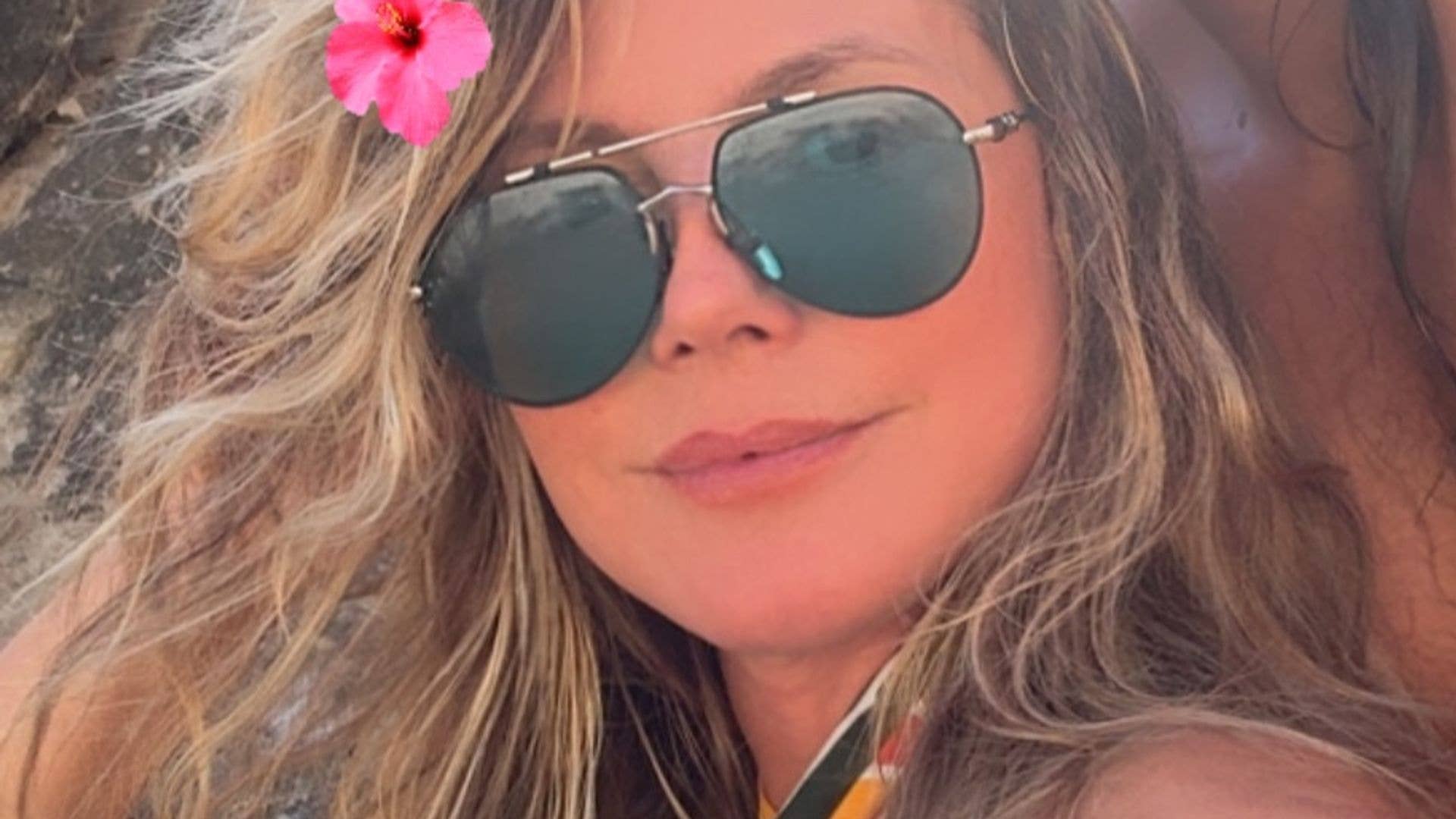 Heidi Klum, 53, branded a ‘tease’ as she strips down for sultry sunbathing photo on the beach