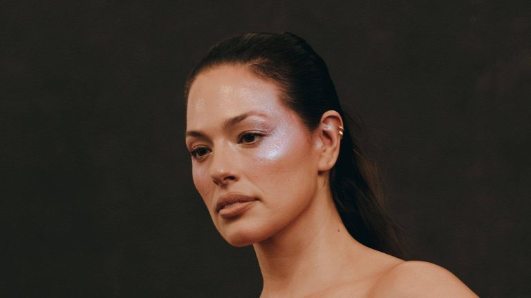 Ashley Graham showcases incredible curves in plunging satin dress inside luxurious NYC apartment