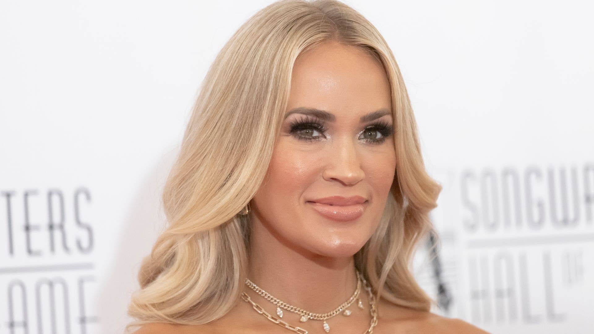 Carrie Underwood sizzles in leather mini dress as she kicks off new era