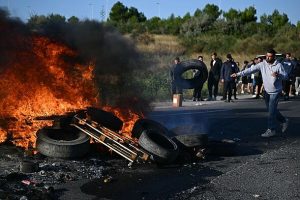 France in chaos as angry fishermen launch blockade in fury over record-high fuel prices