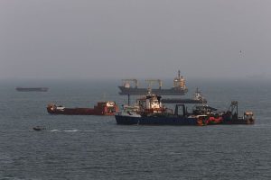Iran claims strike on US ship in Strait of Hormuz as fighting escalates