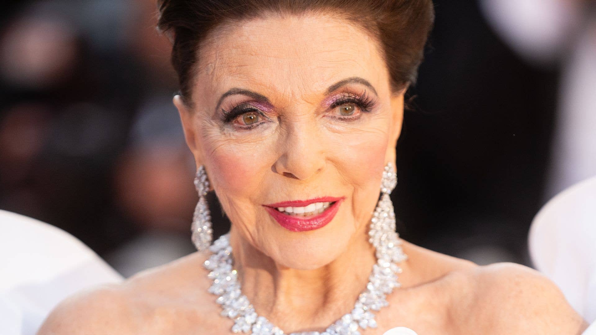 Joan Collins, 93, wears £40 M&S top back-to-front – and it’s her most stylish look yet