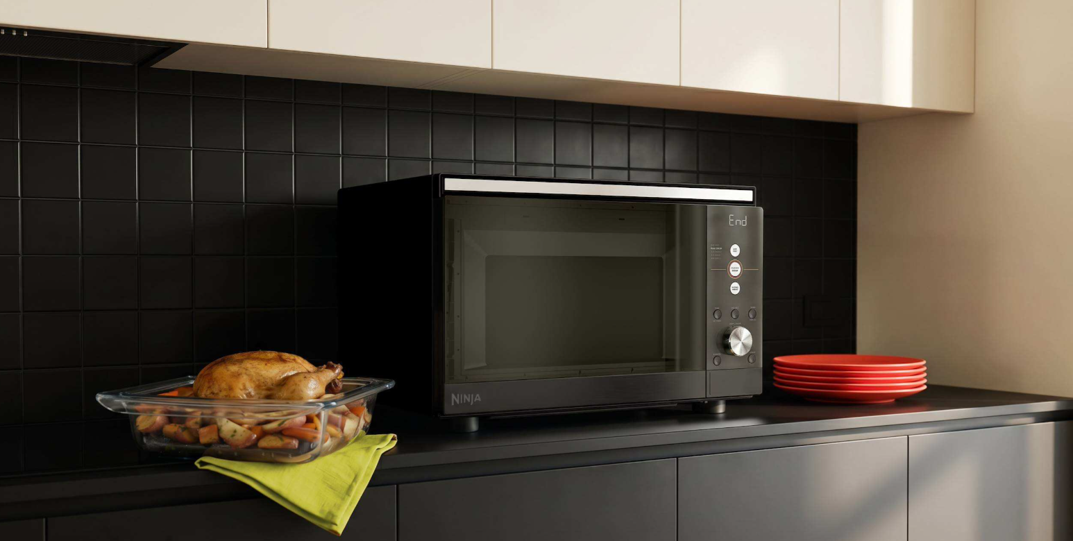 The new Ninja Crispi Microwave cooks and crisps enough food for 8 people — and it might make you want to to pull the plug on your full-sized oven