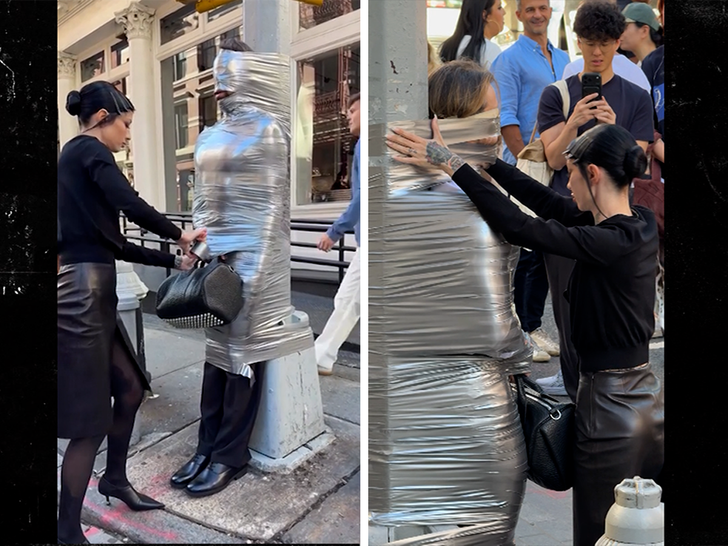 Dominatrix Teams Up With Alexander Wang & Tapes Man To NYC Street Post