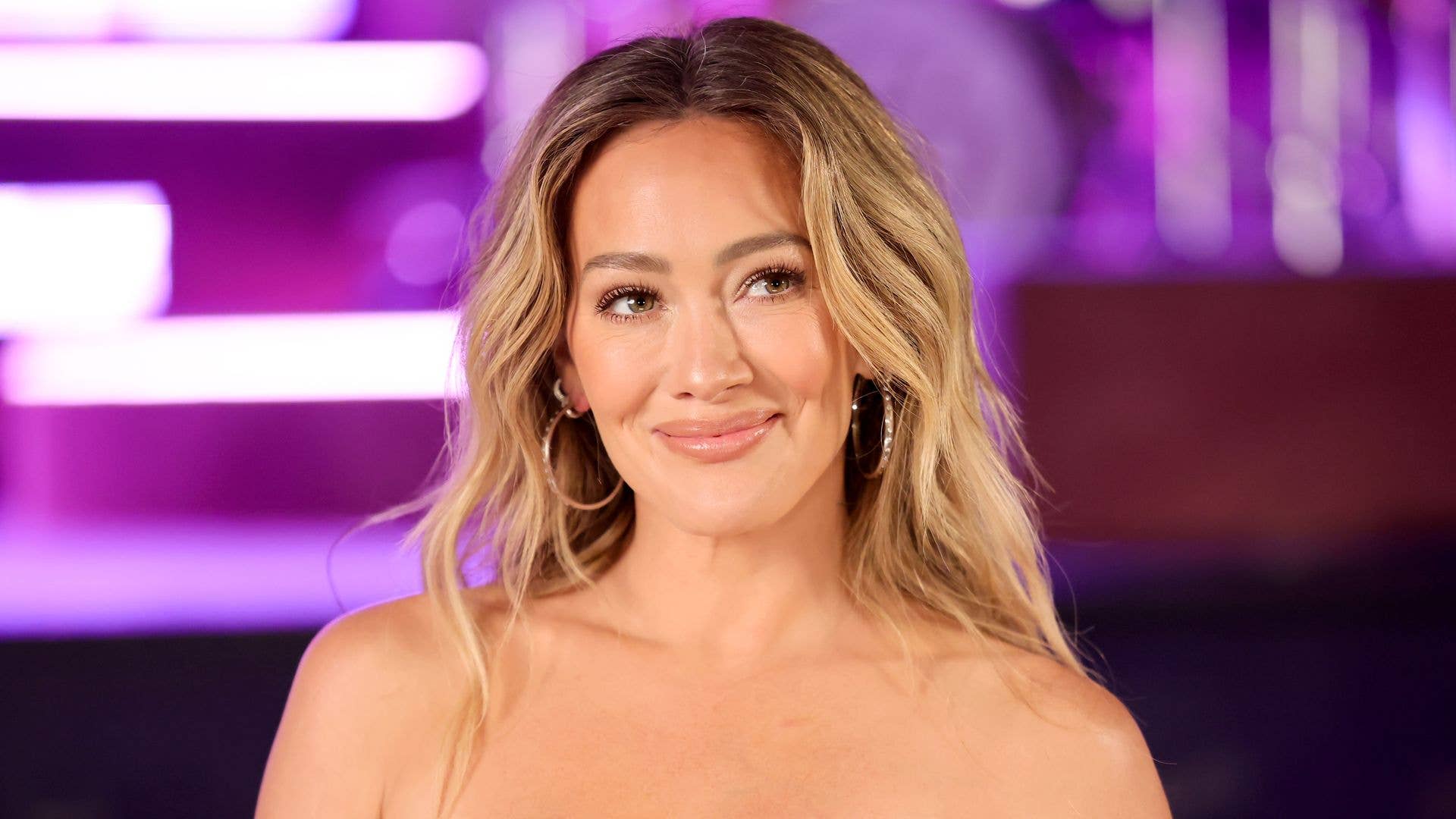 Hilary Duff makes jaws drop in see-through mini dress that glows in the dark