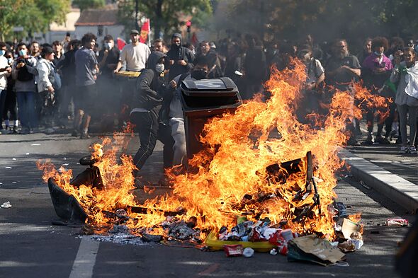 Paris riots: French capital in flames as hundreds of furious protesters arrested